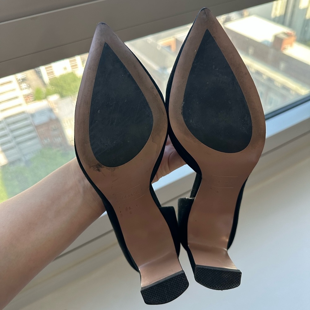Suede black heels. Very comfortable for daily office wear.